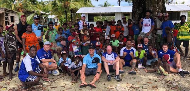 Bulldogs players roll up their sleeves to help out in PNG