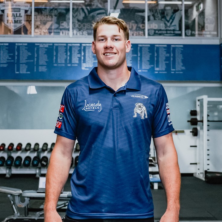 Locked in: Burton kicks on for the Bulldogs