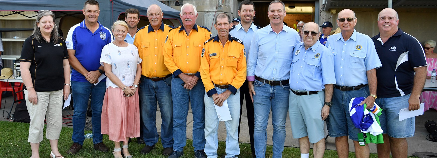 Bulldogs present cheques in Port Macquarie to assist the local area