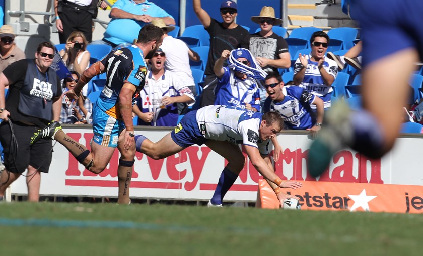 Josh Morris crosses for a try during the club's 30-20 win over the Titans in 2012.