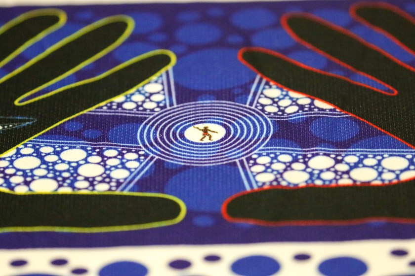 The eight circles represent the eight premierships the club has won.