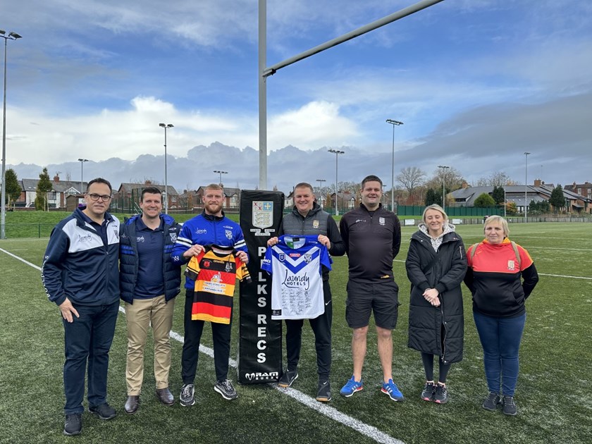 Bulldogs Chairman John Khoury, CEO Aaron Warburton and Player Luke Thompson exchange jerseys at Thompson's junior club, Pilkington Recs in the UK.