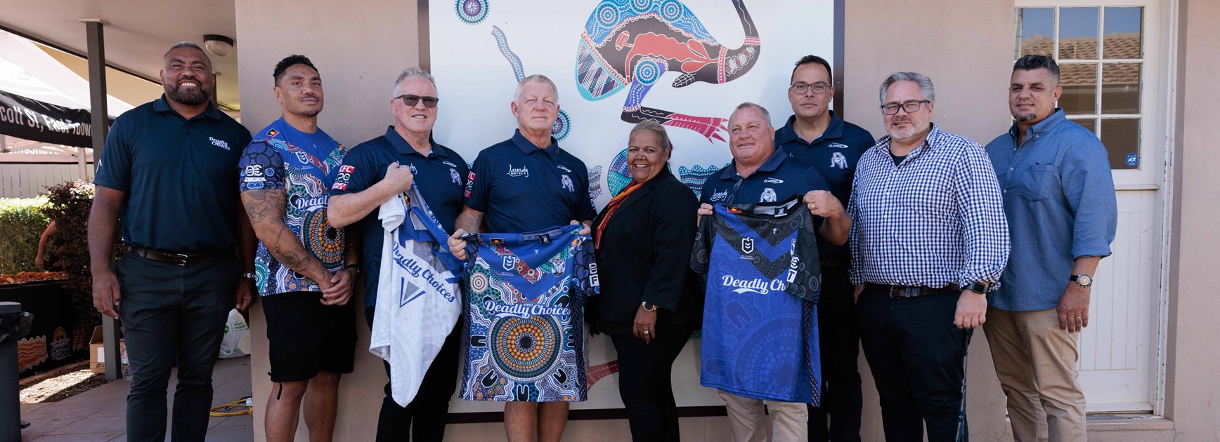 Bulldogs unveil the Deadly Choices health check shirt varieties at Toowoomba’s Goolburri Aboriginal Health Advancement Company Limited.