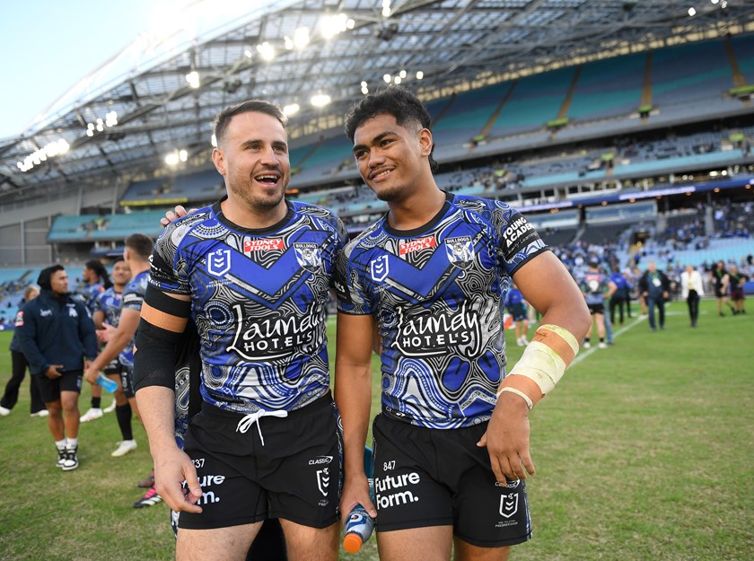 Reynolds with young pup, Karl Oloapu.