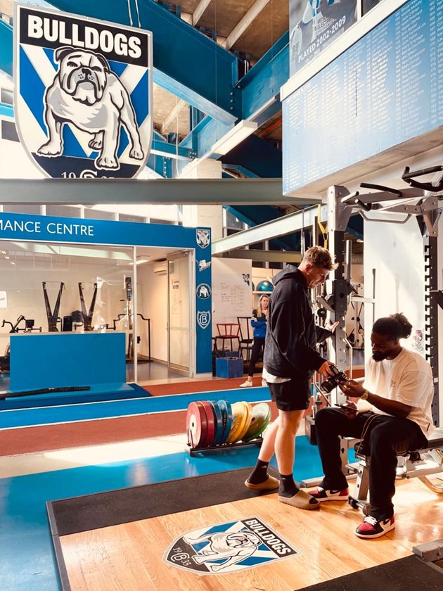 Players practice their photography skills under the watchful eye of club career coach, Renee Liddy.