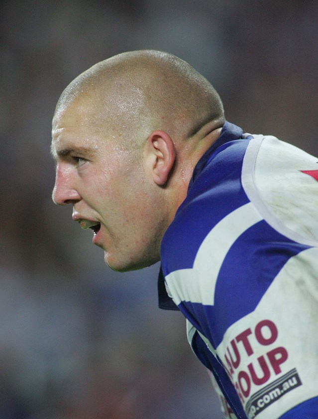 Down But Not Out: Mark O'Meley feeling the heat in the 2004 Preliminary Final. He would go on to run a game-high 205 metres and make 27 tackles in an impressive 55-minutes. 